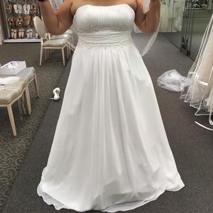 Brand new with tags size 18 wedding dress.